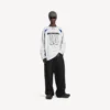 Balenciaga | NBA-samarbejde: Oversized langærmet T-shirt til mænd i hvid/flerfarvet