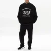 Balenciaga SS21 herre-T-shirt med huller, stor rund hals og lange ærmer, sort 641654TJVI71070