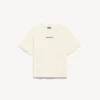 Balenciaga-T-shirt til kvinder med medium pasform og motiv på ryggen i cremefarve