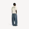 Balenciaga-T-shirt til kvinder med medium pasform og motiv på ryggen i cremefarve