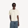 Balenciaga-T-shirt til kvinder med medium pasform og motiv på ryggen i cremefarve