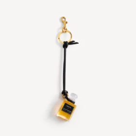 Charm i form af en miniatureparfumeflaske i sort