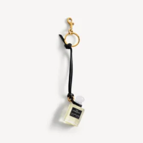 Charm i form af en miniatureparfumeflaske i sort