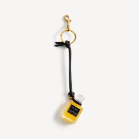 Charm i form af en miniatureparfumeflaske i sort