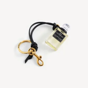 Charm i form af en miniatureparfumeflaske i sort