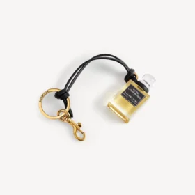 Charm i form af en miniatureparfumeflaske i sort