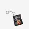 Charm/nøglering med chips-motiv i sort Charm/nøglering med chips-motiv i sort