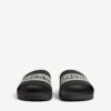 Herresandaler til poolen i sort/hvid Herresandaler til poolen i sort/hvid