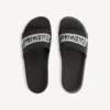 Herresandaler til poolen i sort/hvid Herresandaler til poolen i sort/hvid