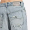 Jeans til kvinder med snoede sømme i lys blå bleget
