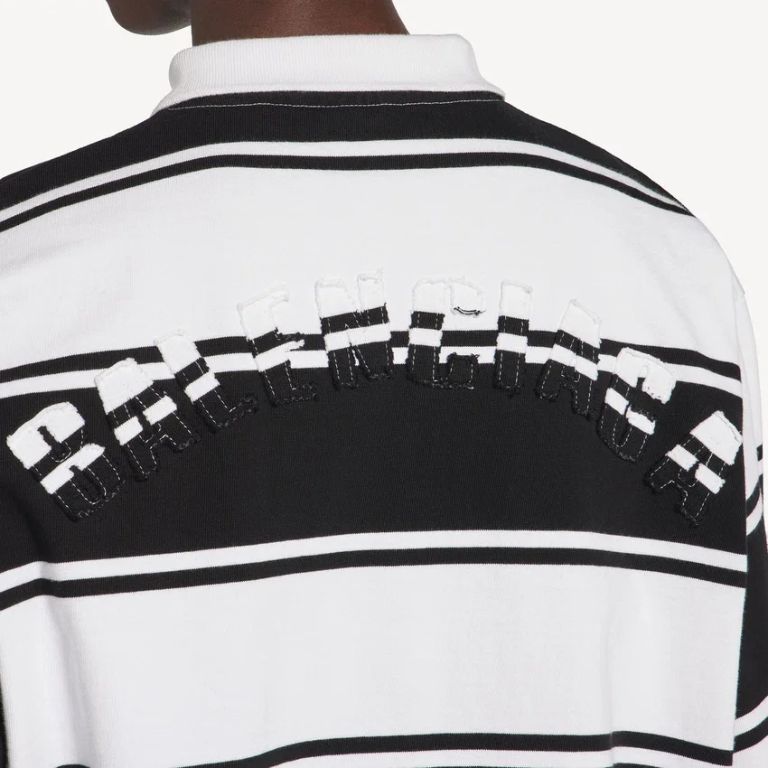 Langærmet herre-poloshirt i sort/hvid Langærmet herre-poloshirt i sort/hvid