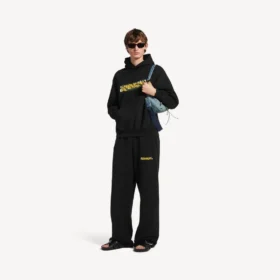 Løse herre-joggingbukser med messy spray-print i sort