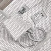 Rodeo-sling-pochette til kvinder med rhinestones i røggrå Rodeo-sling-pochette til kvinder med rhinestones i røggrå