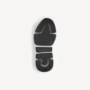 Speed 2.0-sneaker til kvinder i genanvendt strik med tofarvet sål i sort/hvid Speed 2.0-sneaker til kvinder i genanvendt strik med tofarvet sål i sort/hvid
