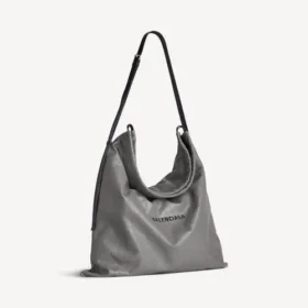Stor crossbody-taske til herre i gråt med støvpose