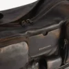 Stor herre-slingtaske i brunt med masser af detaljer Stor herre-slingtaske i brunt med masser af detaljer