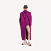 Techwear-bodysuit til kvinder med korte lange ærmer i violet/orange Techwear-bodysuit til kvinder med korte lange ærmer i violet/orange