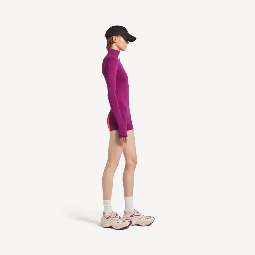 Techwear-bodysuit til kvinder med korte lange ærmer i violet/orange Techwear-bodysuit til kvinder med korte lange ærmer i violet/orange