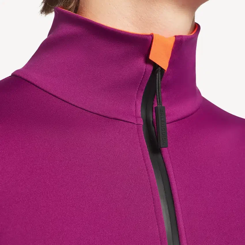 Techwear-bodysuit til kvinder med korte lange ærmer i violet/orange Techwear-bodysuit til kvinder med korte lange ærmer i violet/orange