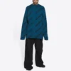 Uldstrikket sweater med rund hals og logo overalt “Petrol Blue” 657400T15672470