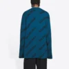 Uldstrikket sweater med rund hals og logo overalt “Petrol Blue” 657400T15672470